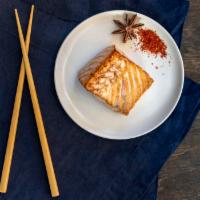 Poached Salmon · Alaskan Wild Salmon with ginger, star anise, and light soy broth