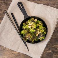 Charred Broccoli With Lemon · Gluten free. Vegan. Broccoli with garlic, Korean chili flakes, scallion infused EVOO, and le...