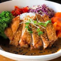 Katsu Curry Don · Panko breaded and fried cutlet with a flavorful brown curry sauce over Japanese short-grain ...
