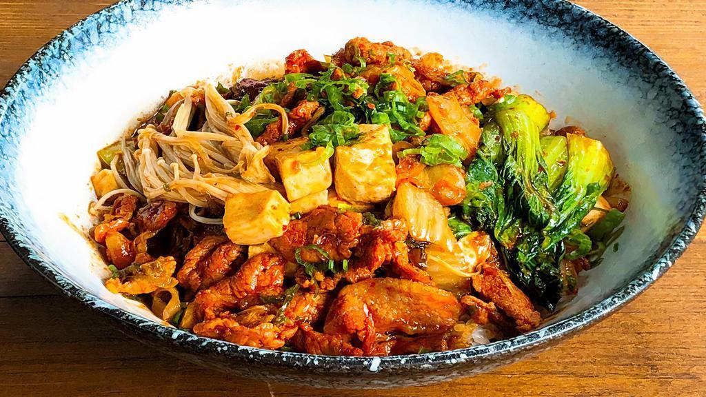 Spicy Pork Kimchi Don · Medium-hot. Sautéed sliced pork, tofu, kimchi, and enoki mushroom, served with sweet and spicy ginger sauce over Japanese short-grain white rice. Spicy. Contains fish.