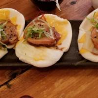 Steamed Gua Bao Buns Pork · Steamed buns stuffed with chashu (Braised Pork), spicy mayo and scallions.