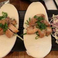 Chicken Nanban Buns · Mild. Steamed buns stuffed with boneless fried chicken with a Japanese bbq nanban sauce and ...