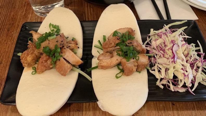 Chicken Nanban Buns · Mild. Steamed buns stuffed with boneless fried chicken with a Japanese bbq nanban sauce and shredded cucumbers.