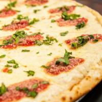 Fresh Mozzarella Pizza · Fresh mozzarella cheese, tomatoes, fresh basil, herbs and olive oil. Baked until the top bub...