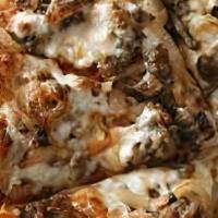 Sausage Pizza · Baked until the top bubbles and the bottom is crisp.