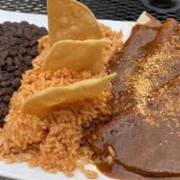 Enchiladas Platter · (3) Chicken or Cheese. Choice of Mole Poblano or Green Sauce.