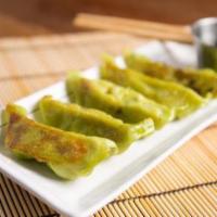 Vegetable Gyoza · 6 pieces pan-seared vegetable dumplings