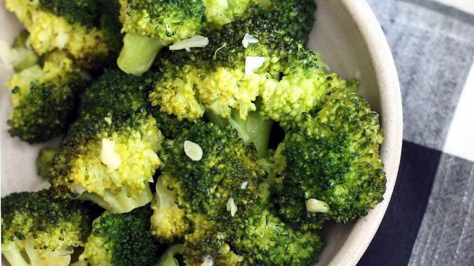 Garlic Broccoil · Broiled broccoli with light brown sauce.
