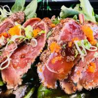 Tuna Tataki · Torched black pepper tuna , tobiko , scallion , ponzu sauce
