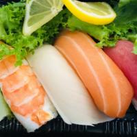 Sushi Appetizer · Tuna, salmon, white tuna and shrimp.