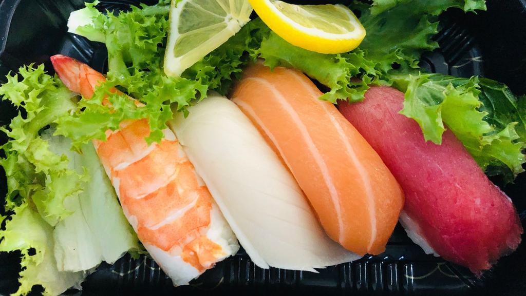 Sushi Appetizer · Tuna, salmon, white tuna and shrimp.