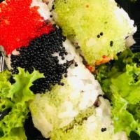 Tricolor Wasabi Roll · Tuna, salmon and avocado topped with tri color caviar.