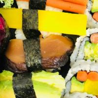 Vegetable Sushi Deluxe Entrée · Nine pieces of vegetable sushi and a vegetable roll.