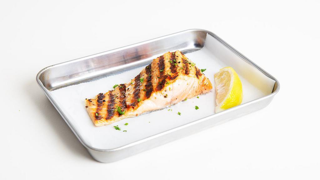 Grilled Salmon · Pan-seared salmon filet with cajun seasoning and your choice of side.