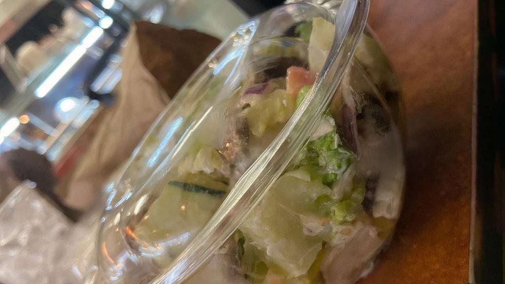 Gyro Salad · Romaine, tomato, feta, cucumber, red onions, oregano, gyro and tzatziki sauce.
