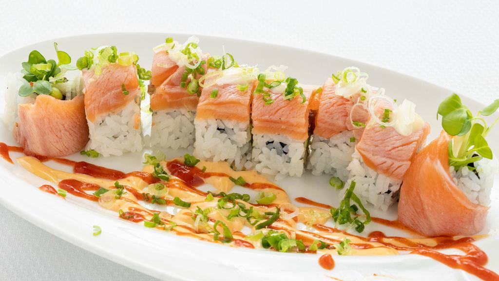 Salmon Lover · Order of three pieces sushi, six pieces sashimi, one salmon roll and your choice of side.