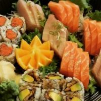 Sashimi Deluxe · Order of 18 pieces assorted raw fish and your choice of side.