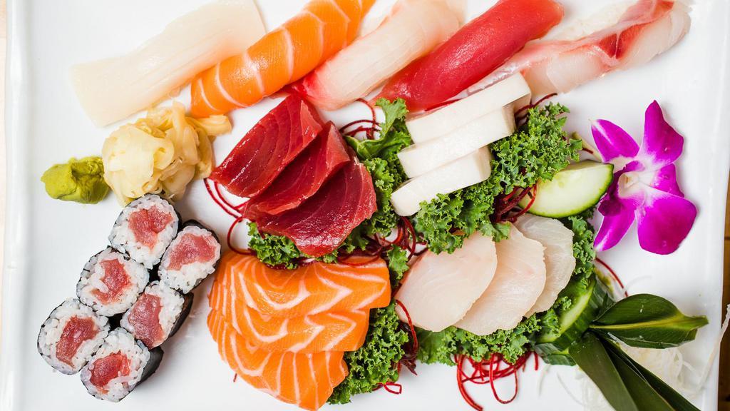 Sushi & Sashimi Combo · Four pieces of sushi and three kinds of sashimi and California roll.