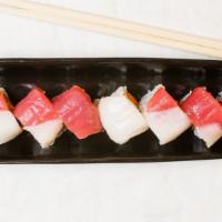 Christmas Roll · Spicy tuna inside out with white tuna and tuna.