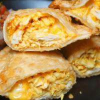 Shredded Chicken Empanadas · With cheese.