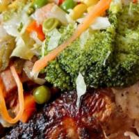 Jerk Chicken · Delicious Jamaican style jerk chicken serves with any side of your choice.