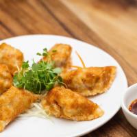 Mandu (Dumplings) · Vegetarian. 6 pcs Steamed or fried dumplings served with garlic soy sauce. Choose Chicken or...