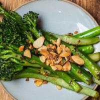 Broccolini · Sauteed Broccolini, shallots, garlic, soy sauce, lemon juice, chili flake, toasted almonds