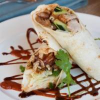Duck Roll · Most popular. Roasted duck with scallions, cucumber, sriracha and hoisin sauce wrapped in a ...