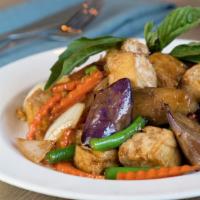 Eggplant Basil · Hot and spicy. Onion, eggplants, and long hot chili in basil sauce. Served with jasmine rice.
