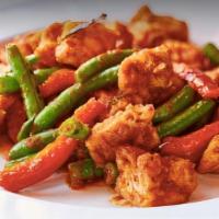 Pad Phig Kning (Curry) · Hot and Spicy. Spicy curry sauce with string beans, bell peppers and sliced lime leaf, serve...