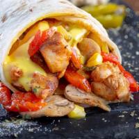 California Chicken Wrap · Fresh grilled chicken with roasted pepper, avocado, lettuce, tomato, and ranch dressing on a...