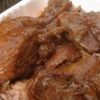Brown Stew Chicken · Tender Fried Chicken Smothered in a Tasty brown Sauce of Spices & Carrot.