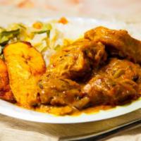 Curry Chicken · Delicious curry chicken served with rice or mac 'n cheese, vegetable and sweet plantain. Inc...
