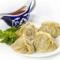 Uyghur Manty With Meat · 5 pieces. Mix of lamb and beef with onions filled dumplings.