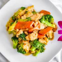 Thai Sweet & Sour Stir Fry · Sautéed chicken with scallions, babycorn, tomato, pimeaple and cucumbers in a Thai sweet and...