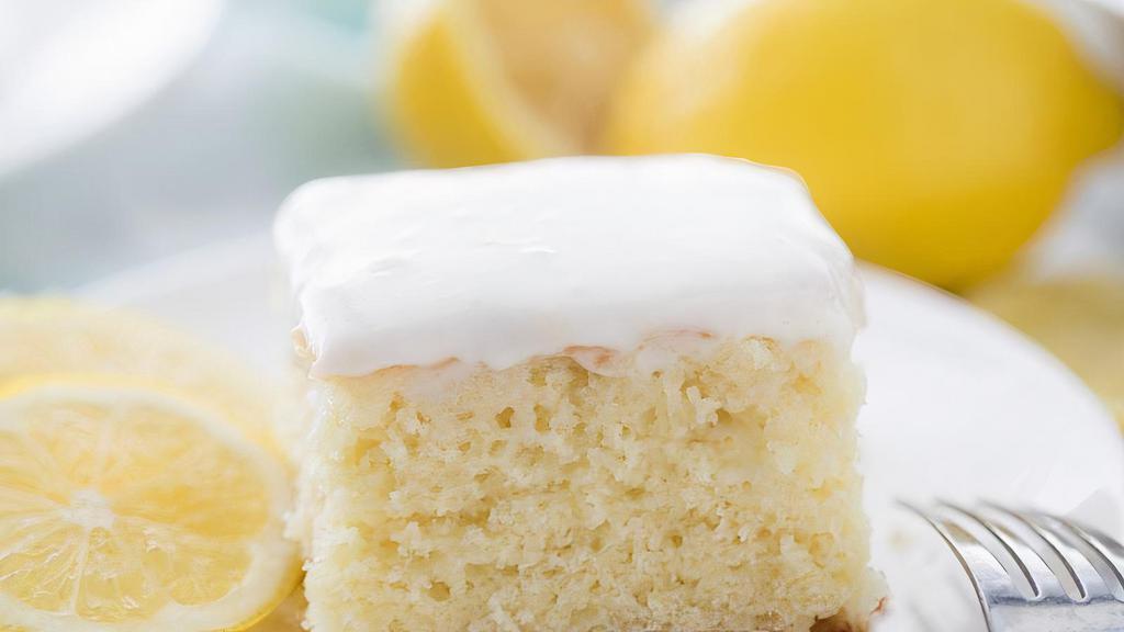 Fresh Refreshing Lemon Cream Cake Slice · This lemon cream cake is the perfect combination of light cake and rich lemon cream filling. Like the olive garden lemon cream cake, but better.