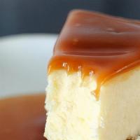 Toffee Crunch Caramel Cheesecake · A New York-style cheesecake infused with salted caramel sauce and topped with even more cara...