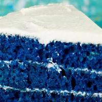 Blue Velvet Cake Slice · This fun twist on the classic red velvet cake takes on a new, blue hue in this royal blue ve...