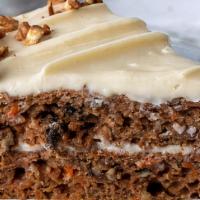 Gluten Free Vegan Carrot Cake Slice · This flavorful, classic, moist gluten-free carrot cake topped with a tangy cream cheese fros...