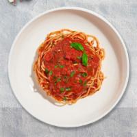 Spaghetti Prime Pomodoro · Fresh spaghetti cooked with classic Italian tomato sauce and fresh basil.