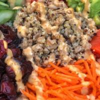 Grain Bowl · Quinoa/Farro + kale + baby greens + avocado + red peppers + cucumbers + dried cranberries + ...