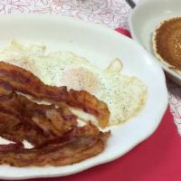 Triple Play · Two pancakes, Two Eggs, Choice of Ham, bacon, sausage, scrapple or pork roll.