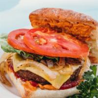The Aloha Burger · House-made chipotle mayo, ketchup, caramelized onions, tomato, lettuce, melty vegan cheese +...