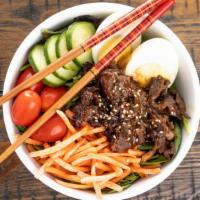 Rice Bowls · Made of chicken adobo, beef bulgogi, greens, carrots, cucumber, and cherry tomato on a bowl ...