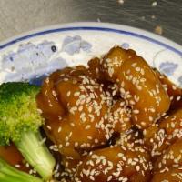 Cs11. Sesame Shrimp · Served with white rice. Crispy deep-fried jumbo shrimp cooked with broccoli and sprinkle of ...