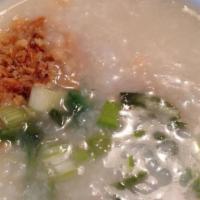 Arroz Caldo  · Popular: A top-rated menu item. Rice soup with chicken and boiled egg.