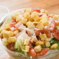 Caesar Salad · Crispy romaine, tomatoes, croutons, romano cheese.