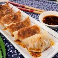 Gyoza (6 Pieces) · Pan-fried or steamed. Pork or vegetable.