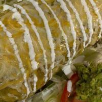 Wet Burrito · LOADED WITH: (CHOICE OF PROTEIN), RICE, WHOLE BEANS, ONION, CILANTRO, AND CHEESE. SMOTHERED ...