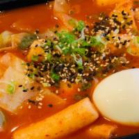 Tteokbokki · Spicy Rice Cake (rice cake, cabbage, scallion, fish cake, soft boiled egg with house gochuja...